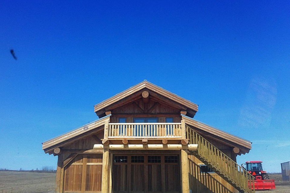 Log Post and Beam Barn with Living Quarters