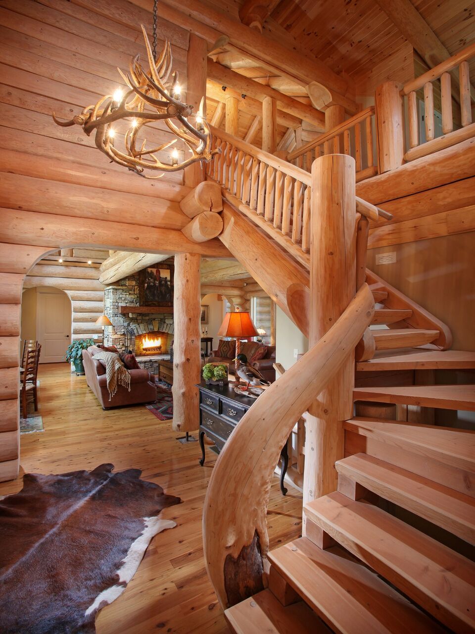Rustic Log Home Staircase - North American Log Crafters